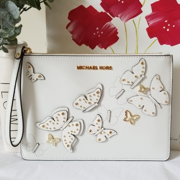 Michael Kors Handbags - NEW/PRICE FIRM 🦋 Michael Kors Zip Clutch